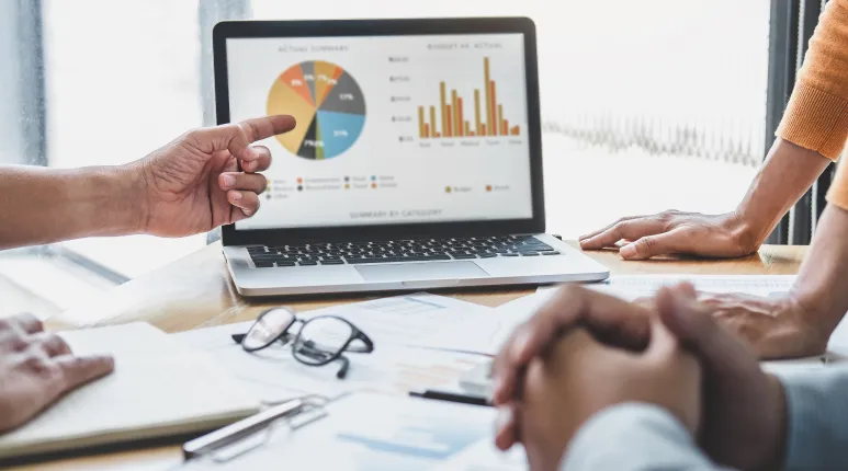 Image of a computer and a coffee mug